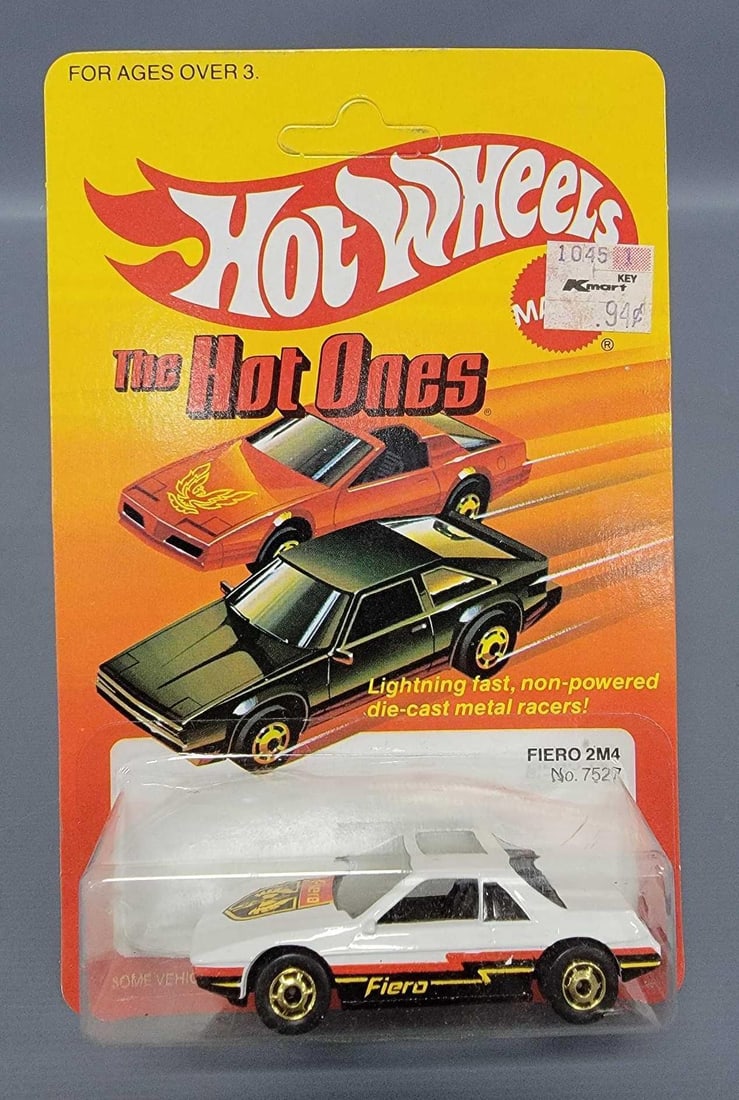 Hot Wheels Hot Ones Fiero 2M4 on blister card 7527: Hot Wheels Hot Ones Fiero 2M4 on blister card, stock number 7527. car is near mint to mint on an excellent unpunched card.