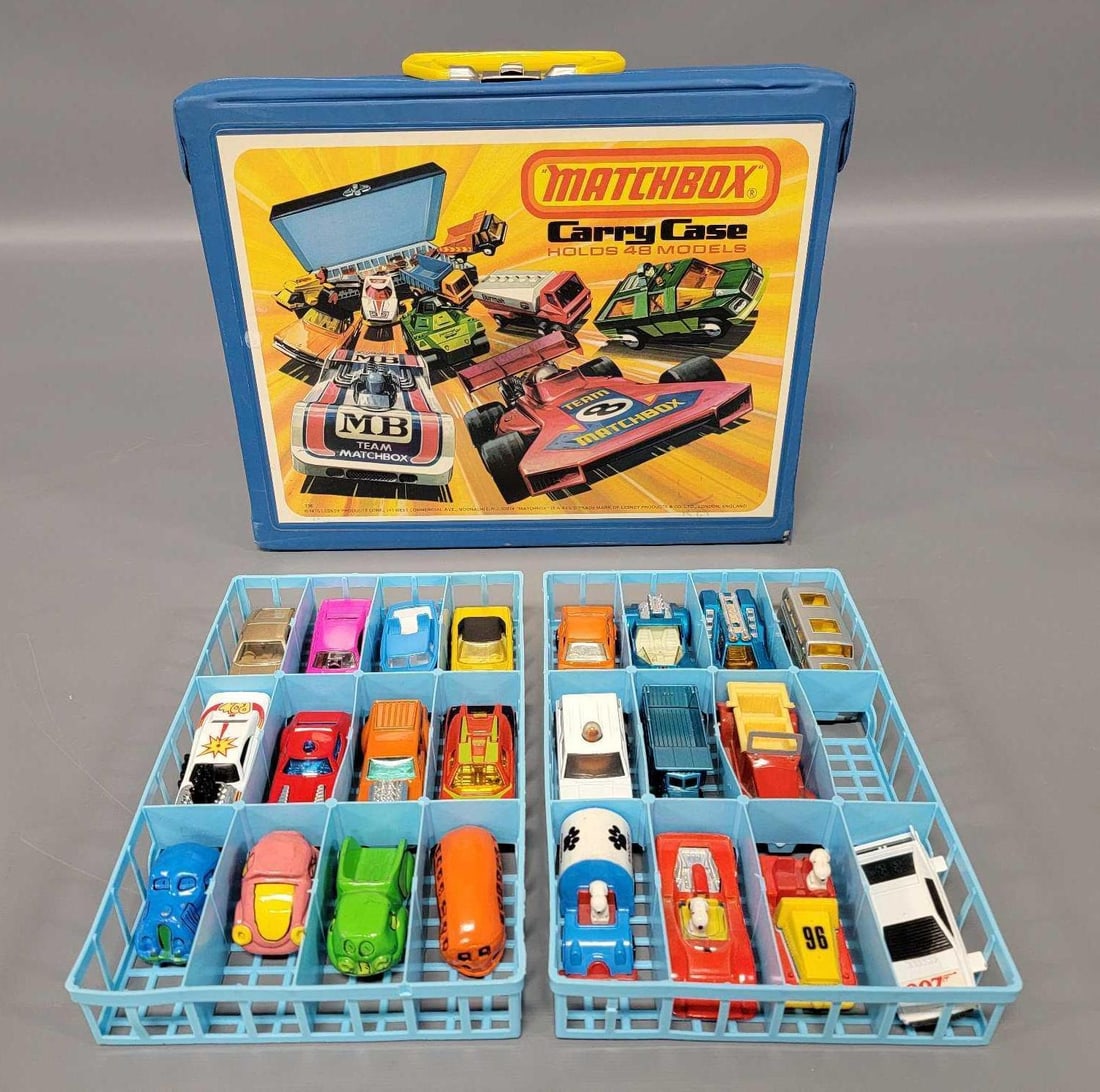 Matchbox case with 23 die cast cars: Matchbox case with 23 die cast cars to include four Hallmark LJN die cast toy cars, three Aviva Snoopy cars, a Corgi Juniors 007 James Bond Lotus Esprit, Tomica F63 American Truck, LJN Road Stars Arch