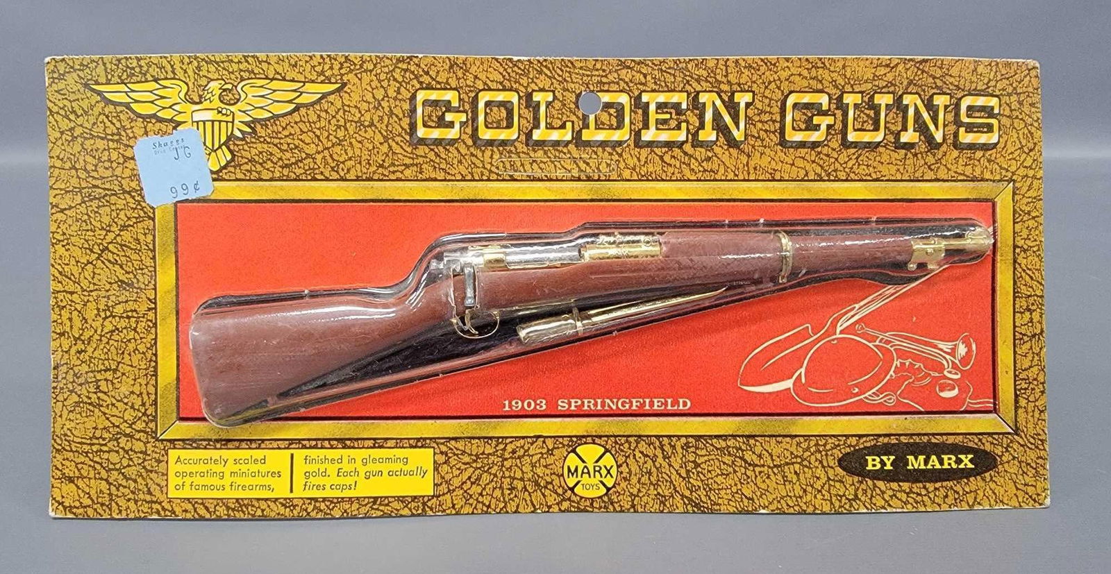 Marx Golden Guns 1903 Springfield rifle on original sealed blister card: Marx Golden Guns 1903 Springfield rifle on original sealed blister card. The toy gun replica measures 8 5/8 inches long whereas the blister card measures 11 x 5 inches and has a 99 cent price sticker
