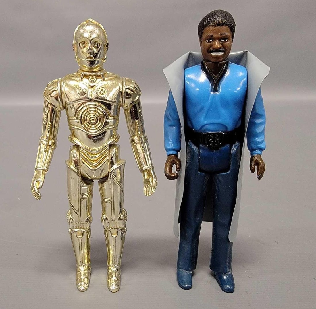 Vintage Kenner Star Wars Bespin Lando with teeth and C3PO: Vintage Kenner Star Wars Bespin Lando with teeth and C3PO. The Lando figure is near mint with tight joints but no blaster. The C3PO is very nice and shiny but has loose joints.