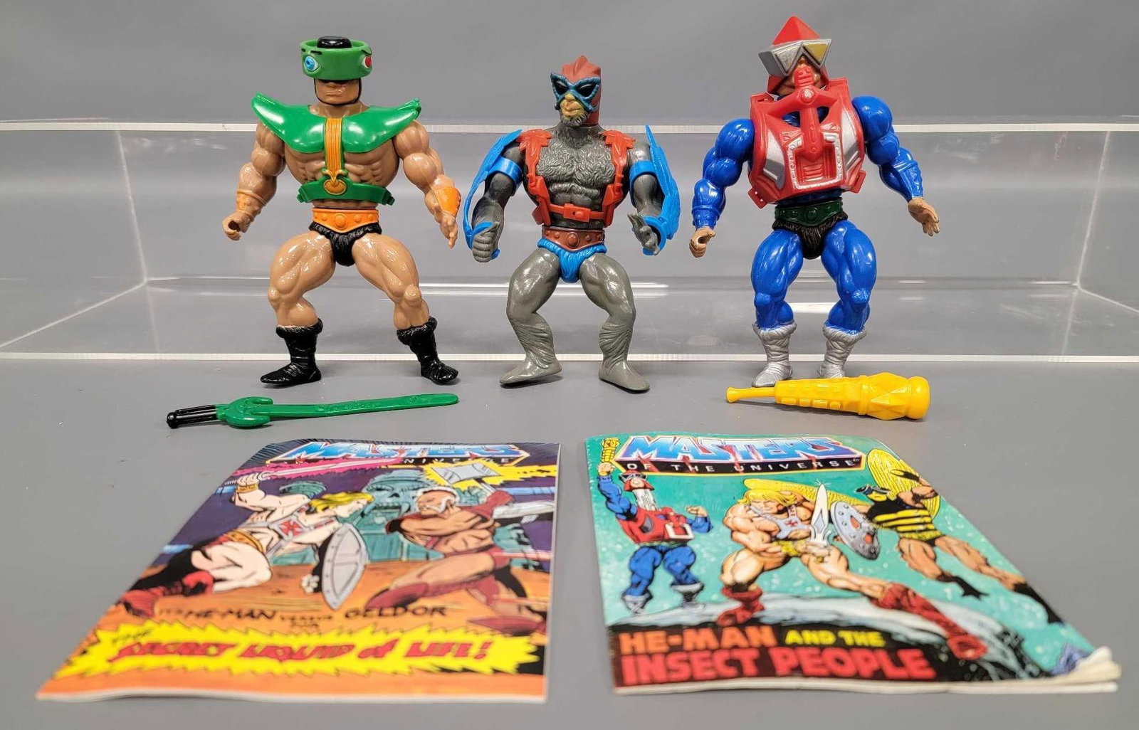 Three complete Mattel MOTU Masters of the Universe figures: Three complete Mattel MOTU Masters of the Universe figures to include Tri-Klops, blue Stratos and Mekaneck, all in excellent condition with weapons and mini comics in fair to very good condition as se