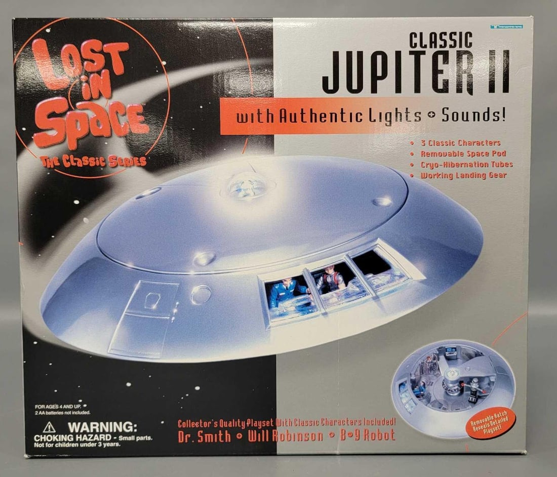 Factory sealed 1998 Trendmasters Lost in Space classic Jupiter II with lights and sounds: Factory sealed 1998 Trendmasters Lost in Space classic Jupiter II with lights and sounds. Still sealed so I am guessing that it is in mint condition. The box has a crease down the front but is otherwi