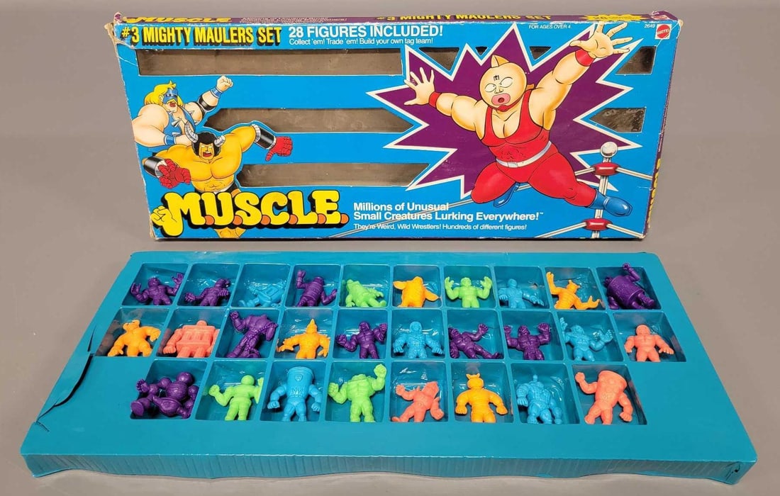 Mattel M.U.S.C.L.E. #3 Mighty Maulers set in original box: Mattel M.U.S.C.L.E. #3 Mighty Maulers set in original box, there are 28 excellent to near mint figures, no duplicates, in purple, blue, green, orange and pink. The original box is in good to very good