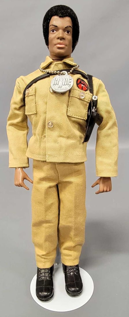 Hasbro GI Joe Adventure team Black Adventurer: Hasbro GI Joe Adventure team Black Adventurer, complete and in superb condition with only one knee crack on the thigh section, a very nice shoulder holster that is cracked at the very tip of the hole