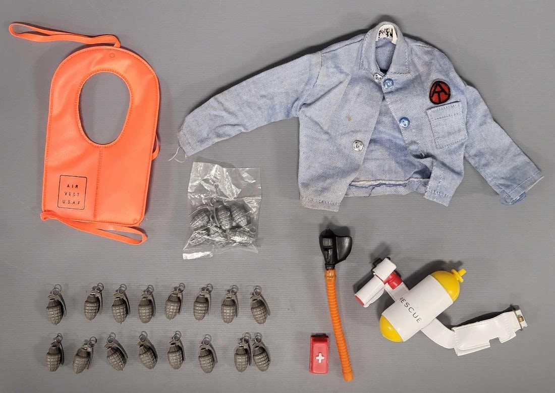 Small group of Hasbro GI Joe accessories: Small group of Hasbro GI Joe accessories to include a partial Emergency Rescue set, a nice USAF air vest and a bunch of hand grenades.