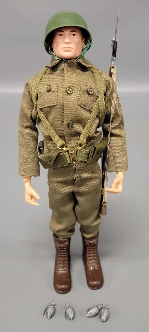 Hasbro GI Joe patent pending action soldier: Hasbro GI Joe patent pending action soldier with great face and hair paint but has cracks on the limbs to include left arm upper bicep and forearm, both upper thighs inside and out. The outfit include