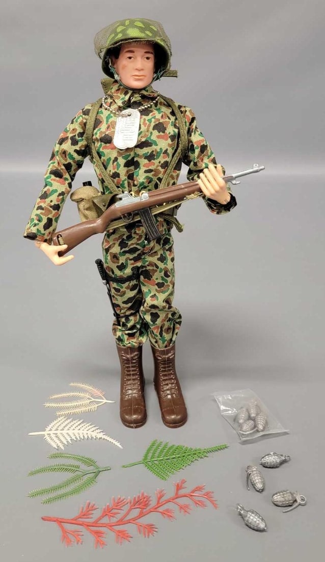 Hasbro GI Joe patent pending action Marine with accessories: Hasbro GI Joe patent pending action Marine with accessories. Figure has great face and hair paint, tight joints with cracks on both knees and upper outer thighs but comes with TM Japan R shirt and pan