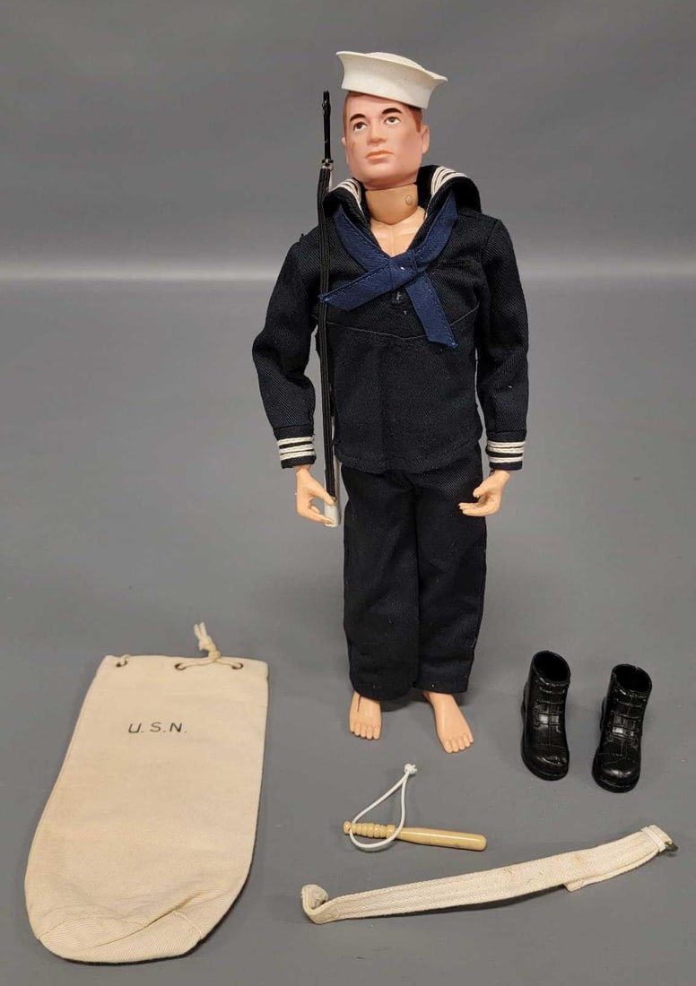 Hasbro GI Joe Shore Patrol with patent pending figure and TM Hasbro outfit: Hasbro GI Joe Shore patrol with patent pending figure. The figure has great face paint but is missing some paint from his head likely due to the soft rubber hat. The joints are tight and it shows very