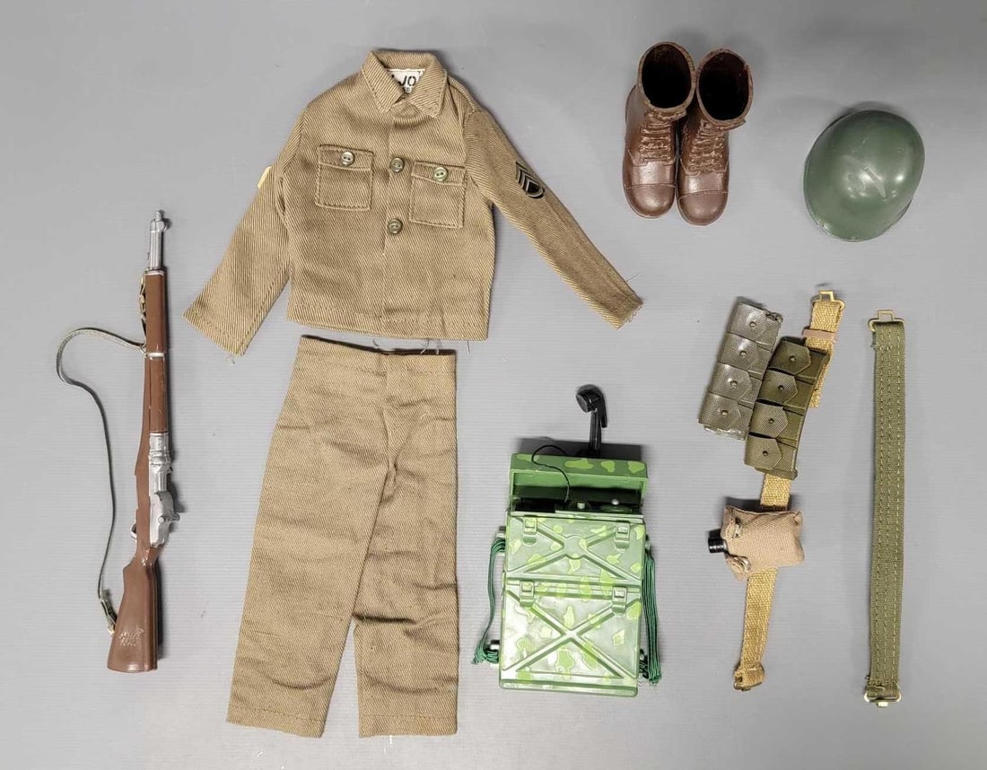 Hasbro GI Joe action soldier outfit and accessories: Hasbro GI Joe action soldier outfit and accessories to include a Hasbro Japan helmet and rifle, rubber boots with a slit on the back of one of them, radio, ammo belt and more, all in very good to exce