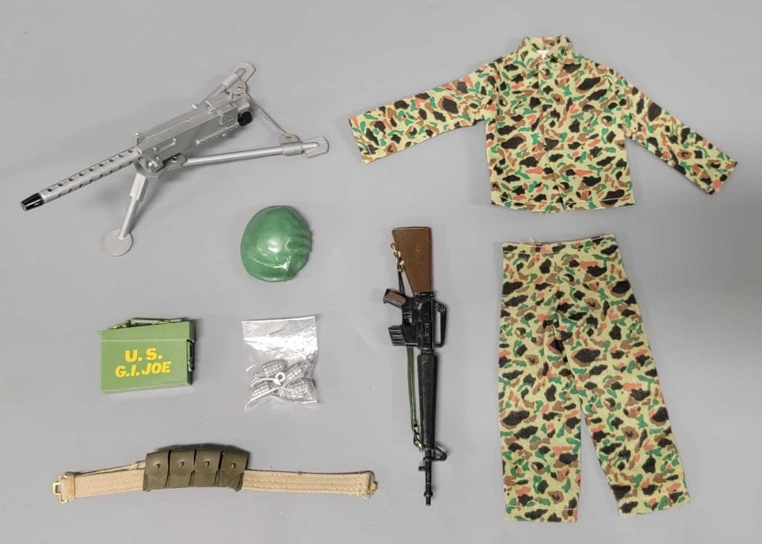 Hasbro GI Joe Green Beret accessories: Hasbro GI Joe Green Beret accessories to include M-16, beret, 30 caliber machine gun on tripod, ammo can pants and shirt, never opened grenades and ammo belt. All in excellent or better condition.