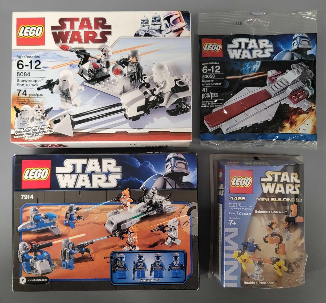 Four unopened small Lego Star Wars sets: Four unopened small Lego Star Wars sets to include 4485 Sebulbas pod racer, 30053 Republic attack cruiser, 8084 snowtrooper battlepack and 7914 Mandalorian battle pack, all mint in excellent to near m