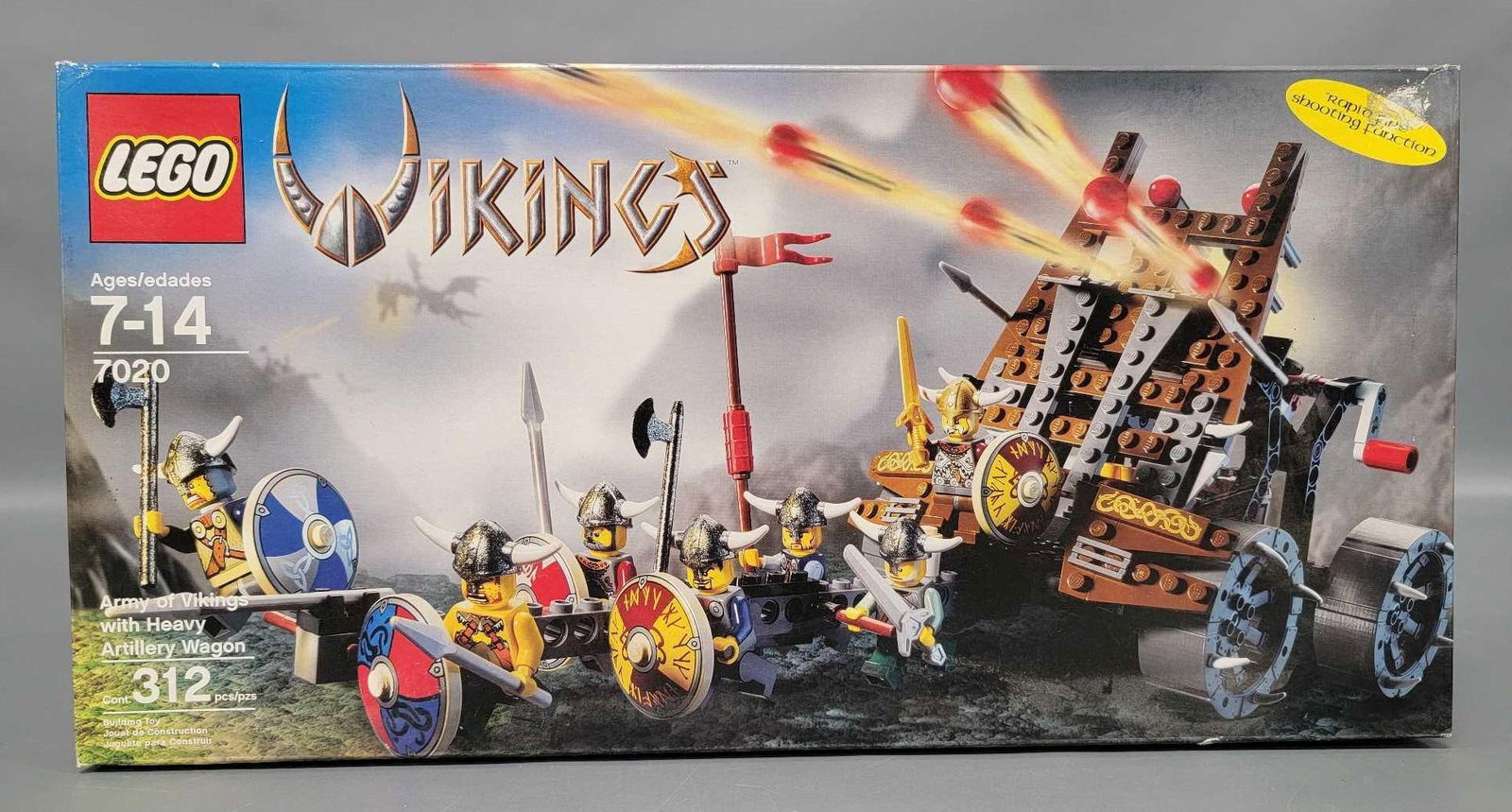 Factory sealed 2006 Lego Vikings 7020 Army of Vikings with heavy artillery wagon: Factory sealed 2006 Lego Vikings 7020 Army of Vikings with heavy artillery wagon. This set has never been opened but the top right corner still has remnants of a removed price sticker and some of the