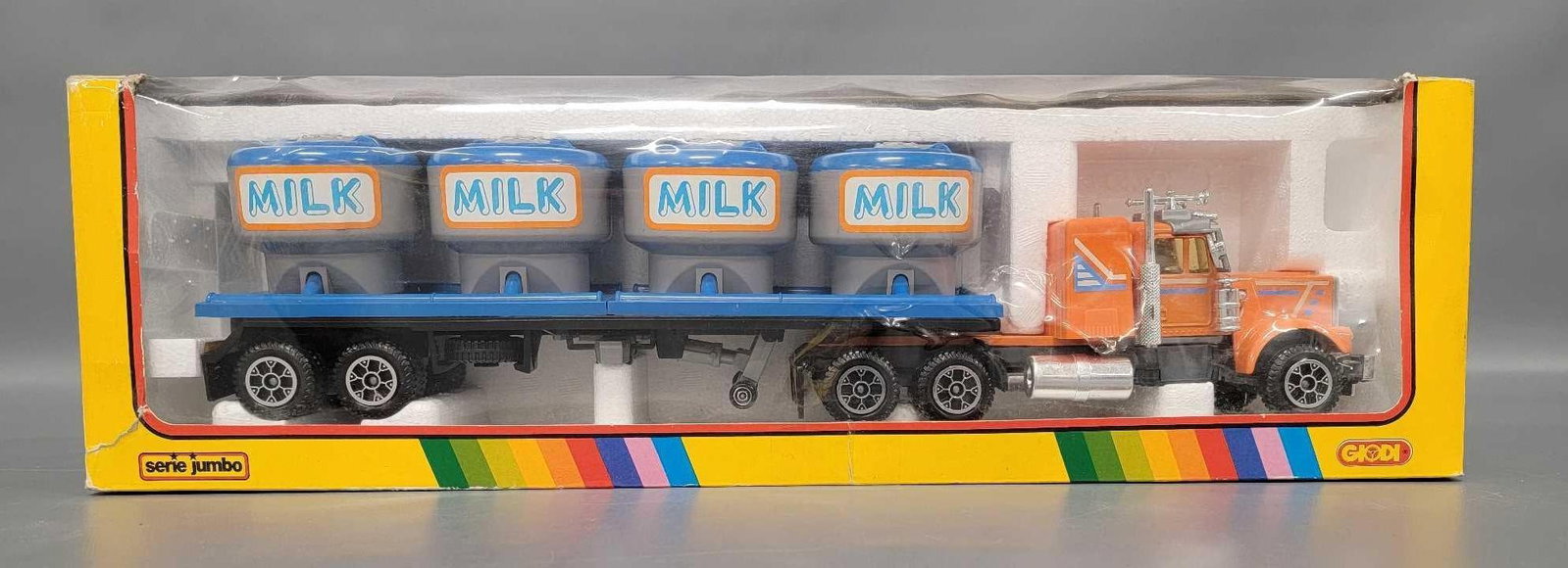 Vintage Giodi Serie Jumbo semi tractor-trailer milk transport in original box: Vintage Giodi Serie Jumbo semi tractor-trailer milk transport in original box. A near mint to mint toy in a very good to excellent original box with original insert. Made of pressed steel and plastic.