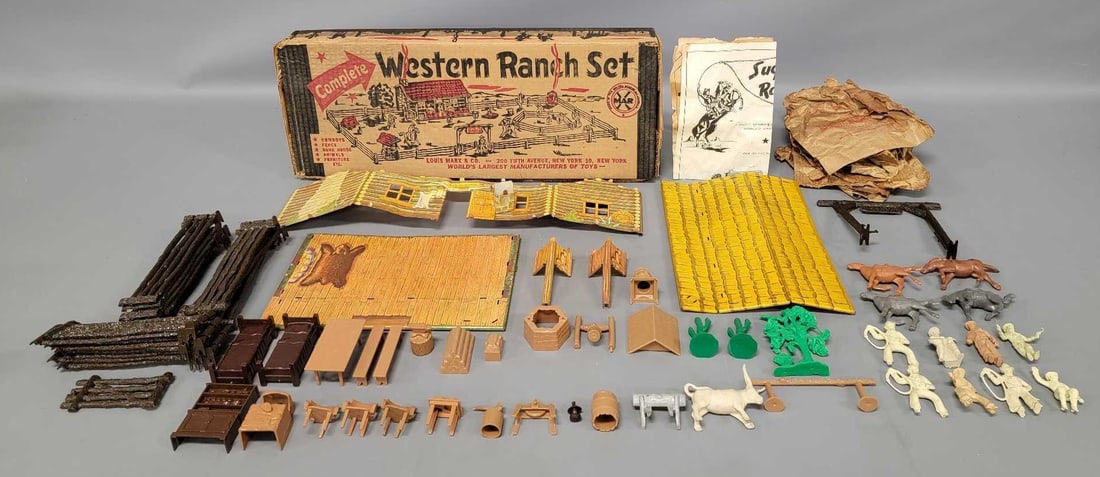 Marx Western Ranch playset in original box: Marx Western Ranch playset in original box. Set includes a bar M Ranch bunkhouse that has been put together and then taken apart, cowboys, animals, furniture, fence and other accessories in very good 