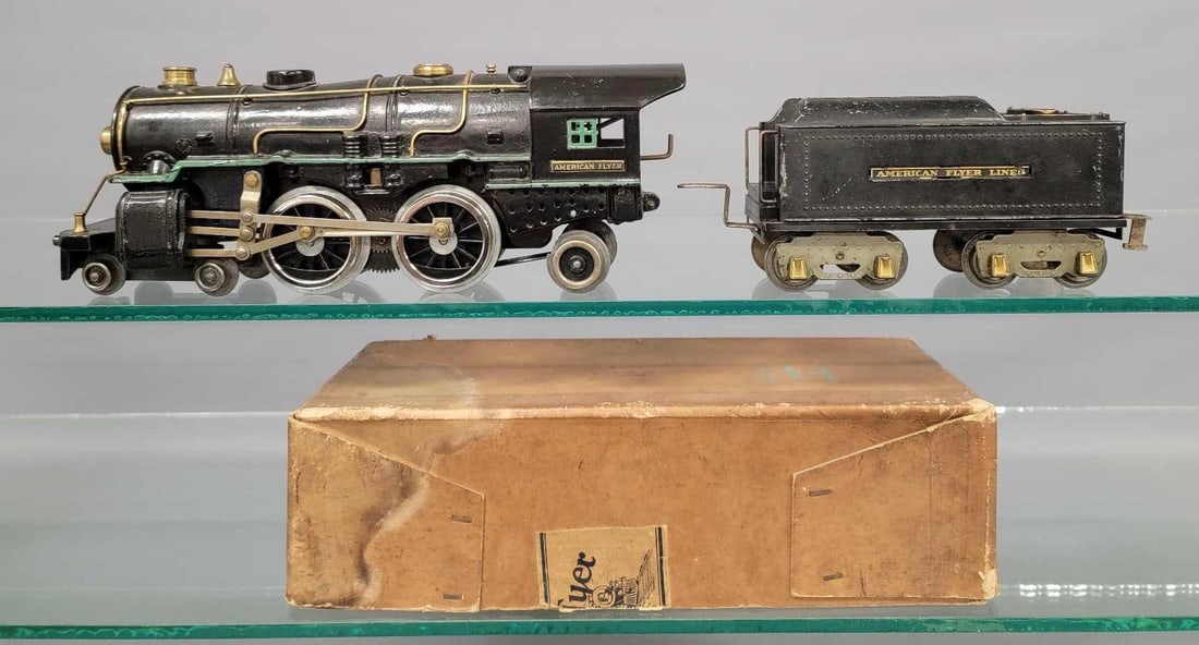 American Flyer wide gauge 4670 steam locomotive with 4671 tender: American Flyer wide gauge 4670 steam locomotive with 4671 tender. The locomotive has replaced drivers and a brass cap on the headlight, both are C7.