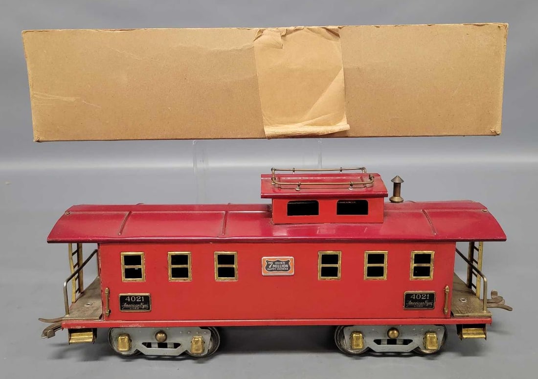 American Flyer wide gauge 4021 caboose in original box: American Flyer wide gauge 4021 caboose in original box, C7 in a complete original box with writing on the top flap.
