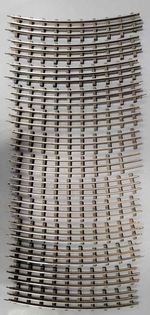 Thirteen Lionel T-Rail curve track sections with hardware for fourteen sections (1 of 6)