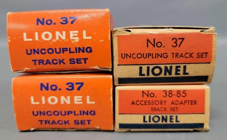 Four Postwar Lionel Super O accessories in original boxes