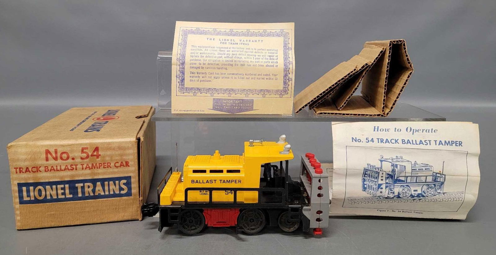 Postwar Lionel 54 Track Ballast Tamper Car in original box (1 of 15)