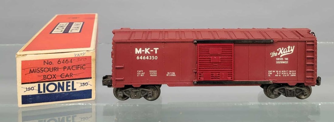 Unrun Lionel postwar 6464-350 MKT Katy box car in box: Unrun Lionel postwar 6464-350 MKT Katy box car in a -150 original box. Car shows light run time and is C7 as seen in the photos.