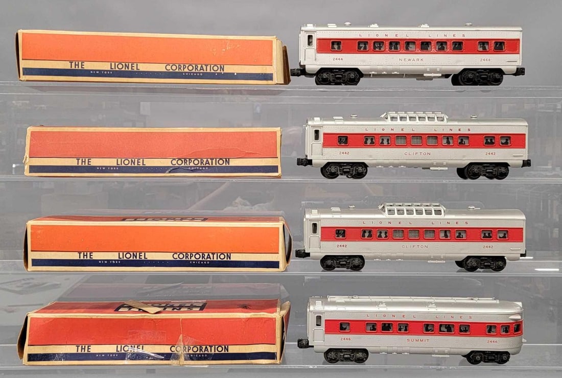 Four Lionel postwar red striped passenger cars in original boxes 2442 2444 2446: Four Lionel postwar red striped passenger cars in original boxes to include two 2442 Clifton illuminated vista dome, 2444 Newark Pullman and 2446 Summit observation cars. Cars show very light run time