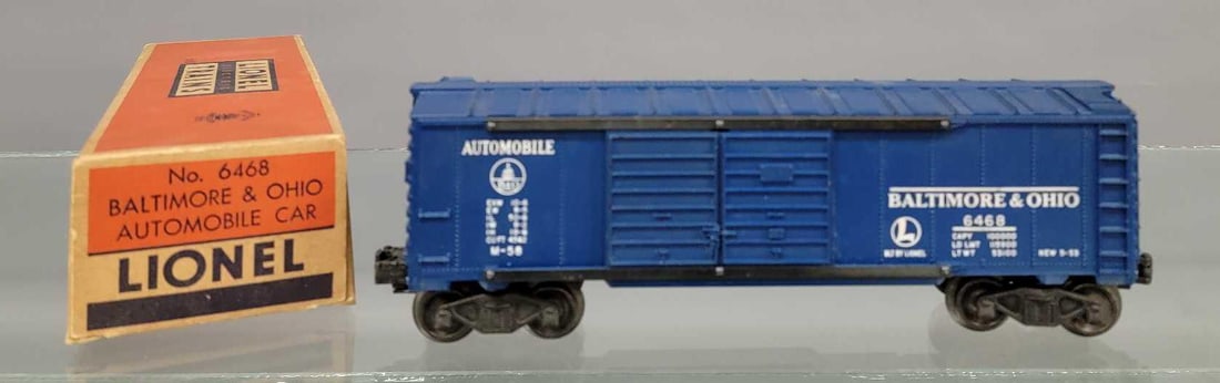 Lionel postwar 6468 Baltimore & Ohio double-door box car in original box: Lionel postwar 6468 Baltimore and Ohio double-door box car in original box. Car shows moderate run time and is C5 due to a piece of the body being cracked / broken off as seen in the photos. It comes