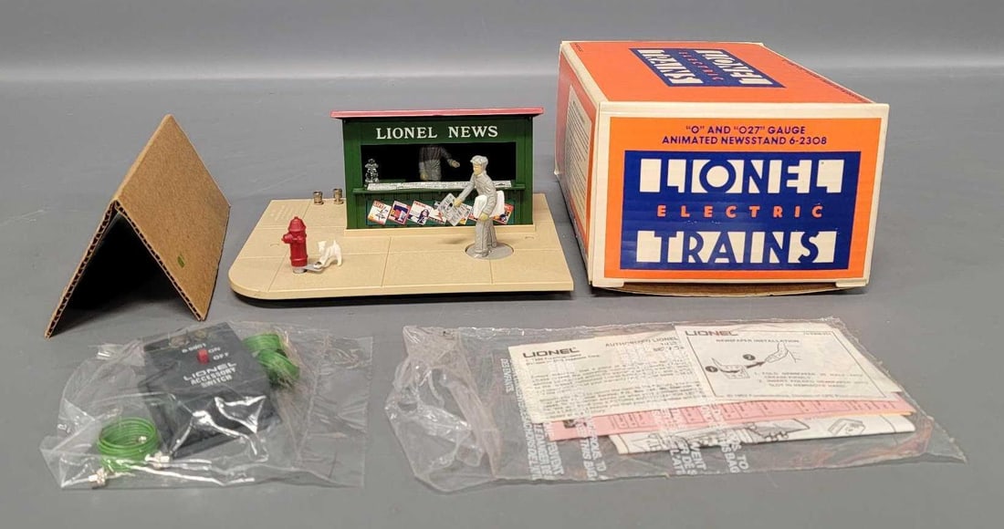 Lionel modern O animated newsstand in original box 2308: Lionel modern O animated newsstand in original box, stock number 2308, C9-10 in an excellent original box with original insert.
