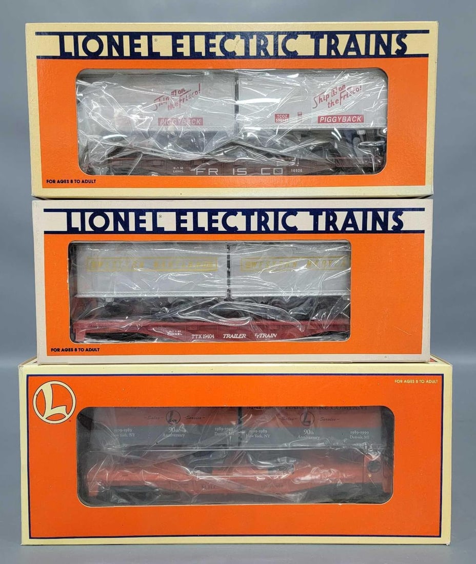 Three Lionel modern O flat car with trailers in original boxes (1 of 2)