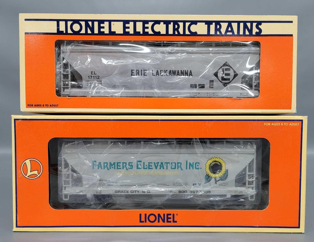 Two Lionel modern O ACF hoppers in original boxes: Two Lionel modern O ACF hoppers in original boxes to include 17112 Erie Lackawanna and 17138 Farmers Elevator Inc, C8-9 in excellent original boxes.