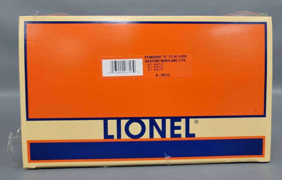 Lionel modern O 26713 Western Maryland flat car 3-pack in original box: Lionel modern O 26713 Western Maryland flat car with logs 3-pack in original box with shipping carton, cars are C8-9 in a near mint original box in carton that it will be shipped in.