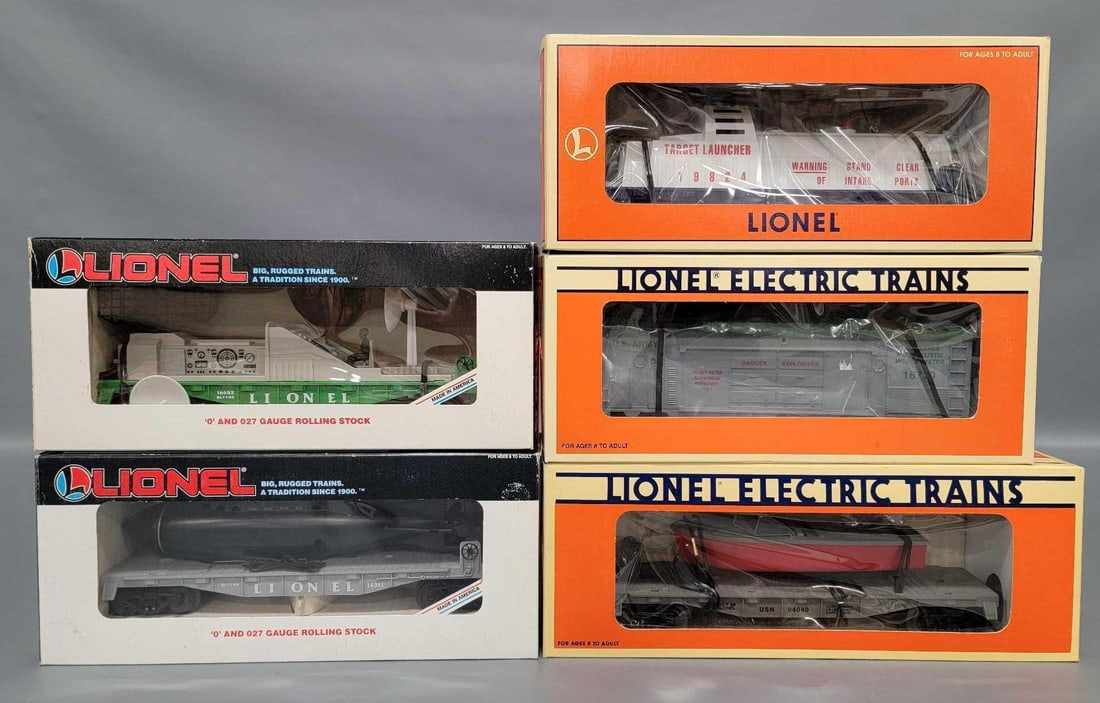 Five Lionel modern O space and military cars in original boxes: Five Lionel modern O space and military cars in original boxes to include 16652 operating radar car, 16351 flat car with submarine, 19824 3470 US Army target launcher, 16710 operating missile car and 
