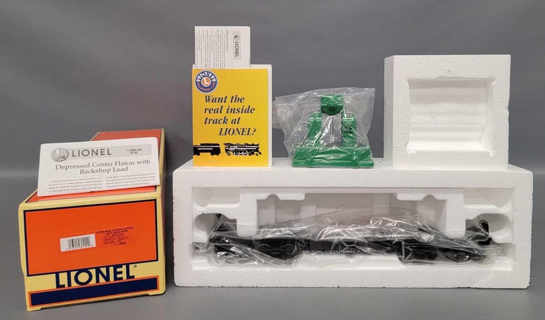 Lionel modern O 36900 depressed center flat car with back shop in original box: Lionel modern O 36900 depressed center flat car with back shop in original box, C10 in a very good original box with original paperwork.