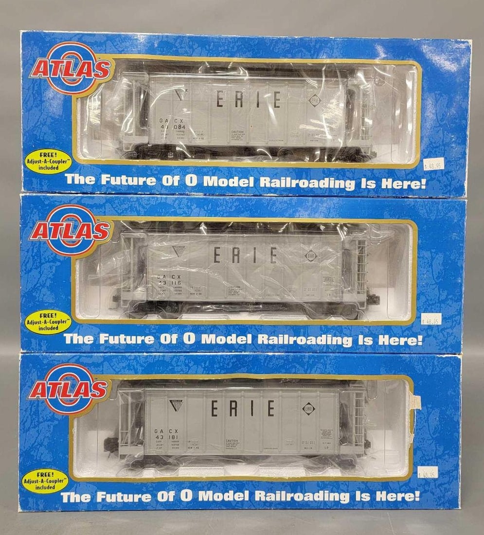 Three Atlas O gauge Erie airslide hoppers in original boxes 6364: Three Atlas O gauge Erie airslide hoppers in original boxes, stock number 6364-1, -3 and -4, C8-9 in very good original boxes.
