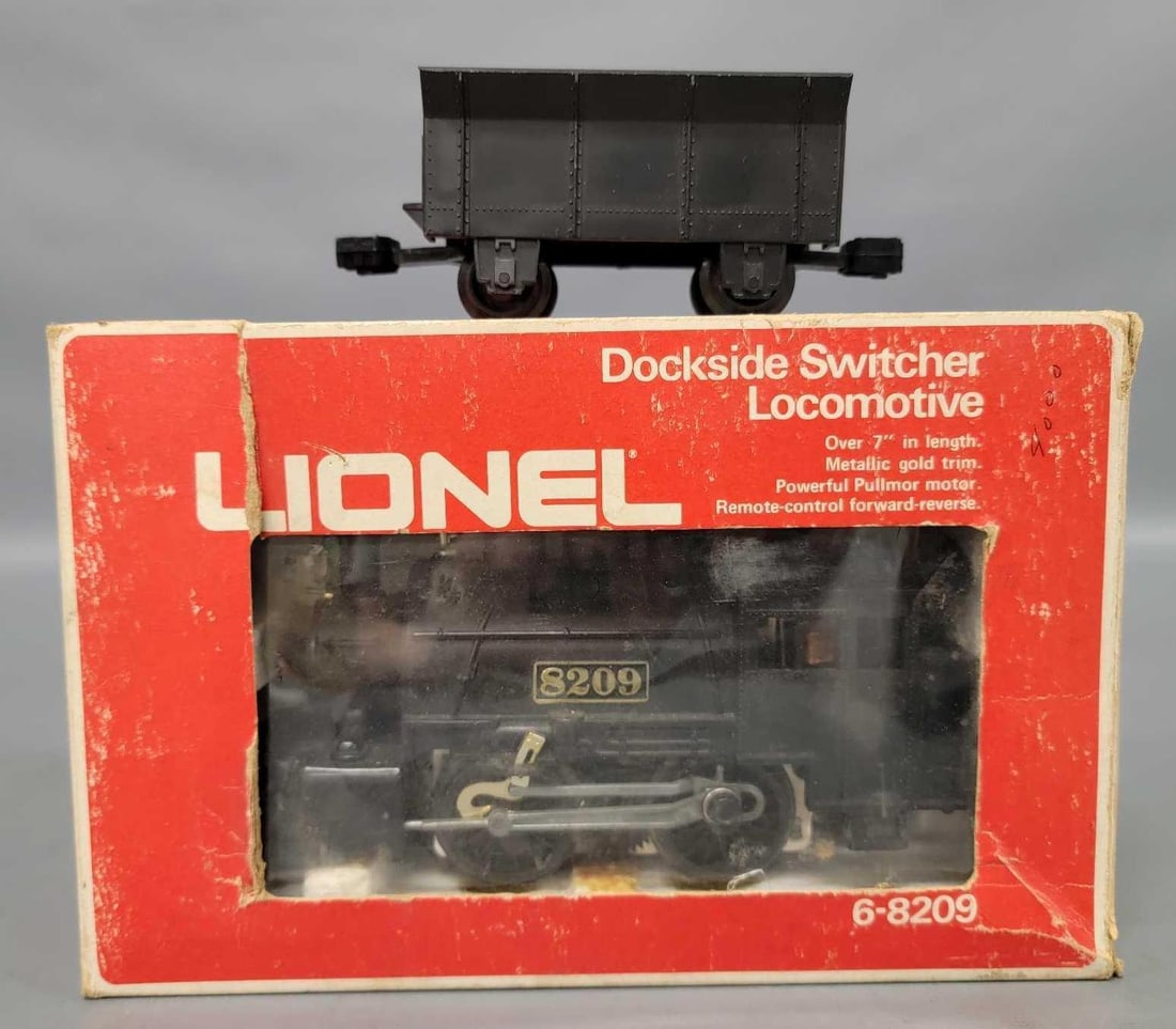 Lionel MPC era dockside switcher locomotive in original box with loose tender 8209: Lionel MPC era dockside switcher locomotive in original box with loose tender, stock number 8209, units show little to no run time , C9 with a fair original box.