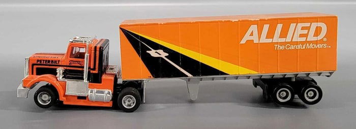 Tyco US 1 Trucking Uniroyal Peterbilt semi tractor slot car with Allied trailer