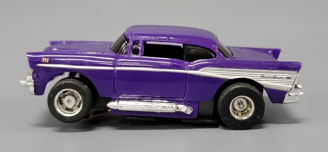 Tyco purple 57 Chevy HO slot car with chrome rims: Tyco purple 57 Chevy HO slot car with chrome rims, car is near mint to mint on an unrun chassis, This has been tested with a 9 volt battery and runs perfectly.