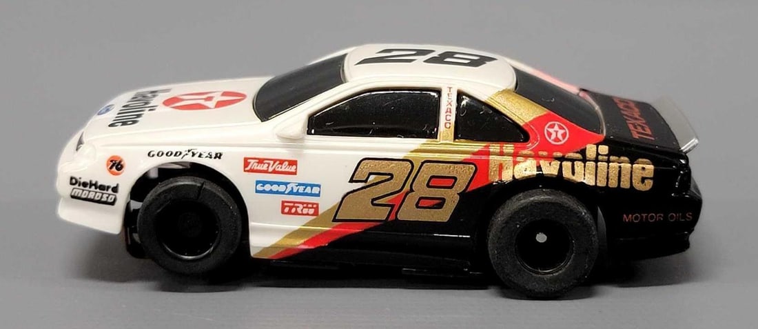 Tyco HO Havoline Texaco #28 Slot Car: Tyco HO Havoline Texaco #28 Slot Car. The car is in excellent to near mint condition on a chassis with very light run time. This has been tested with a 9 volt battery and runs perfectly.
