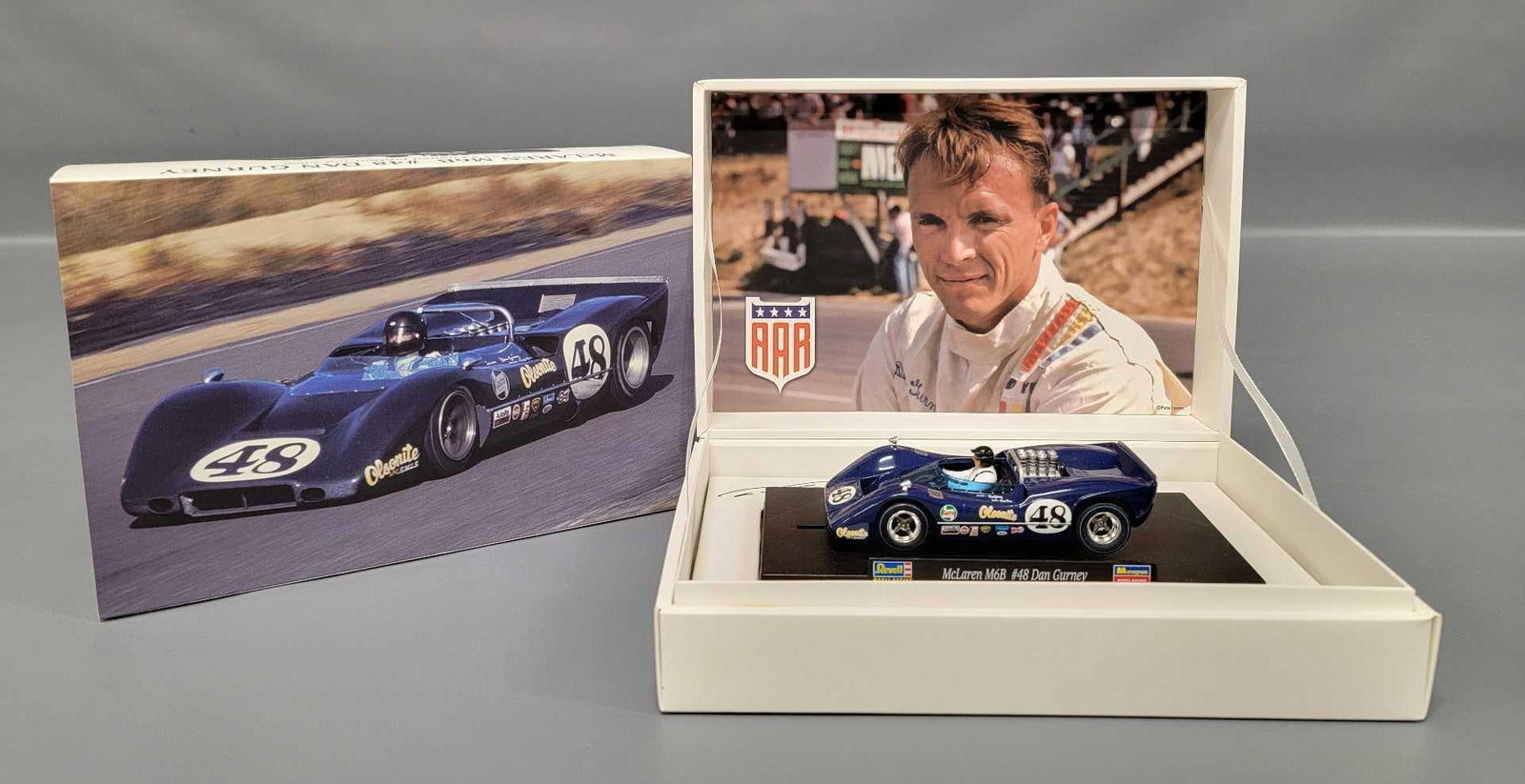 Monogram Revell McLaren M6B #48 Dan Gurney 1:32 slot car in original box: Monogram Revell McLaren M6B #48 Dan Gurney 1:32 slot car in original box, car is near mint to mint in a near mint original box. Limited Edition, 1 of 3000 made.