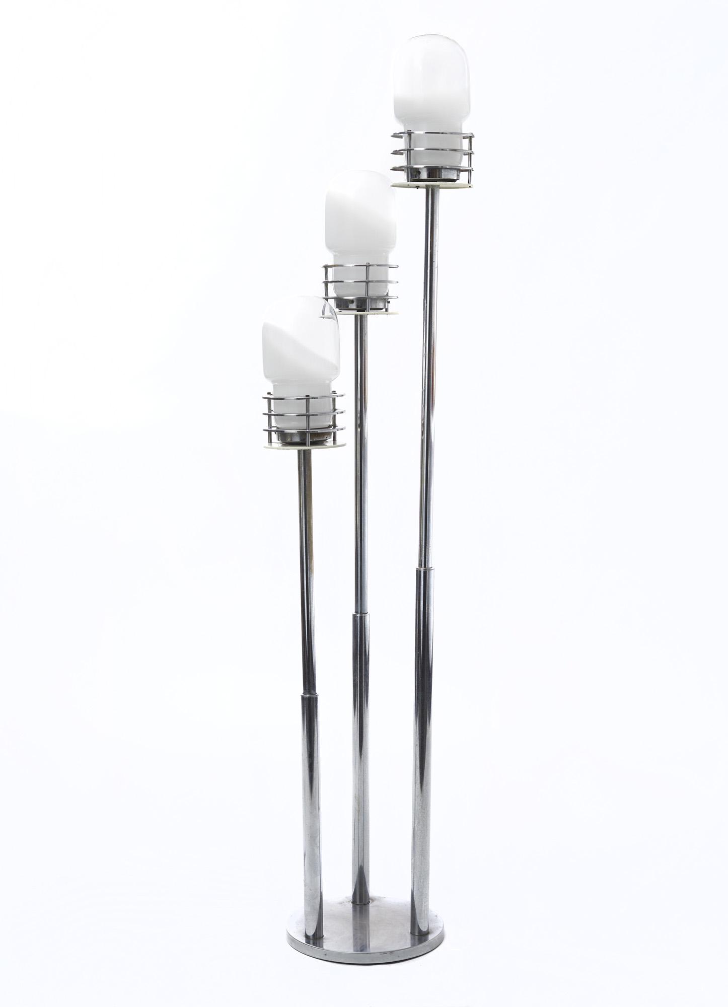 Floor lamp with Murano glass diffusers: Floor lamp with Murano glass diffusers , 1970 ca.H144 cm (H56.69 in )Three-light floor lamp with chromed metal structure and Murano glass diffuser. Chrome metal finish.