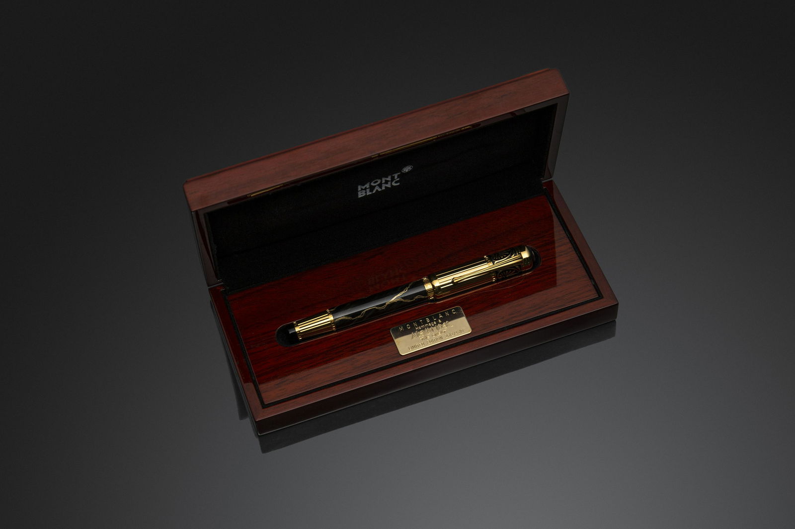 Montblanc Alexander The Great fountain pen: Montblanc "Alexander The Great" Limited Edition fountain pen. N. 2612/4810. It features a black marbled barrel with gold-coloured veins. The plated gold cap is decorated with lotus flowers which form