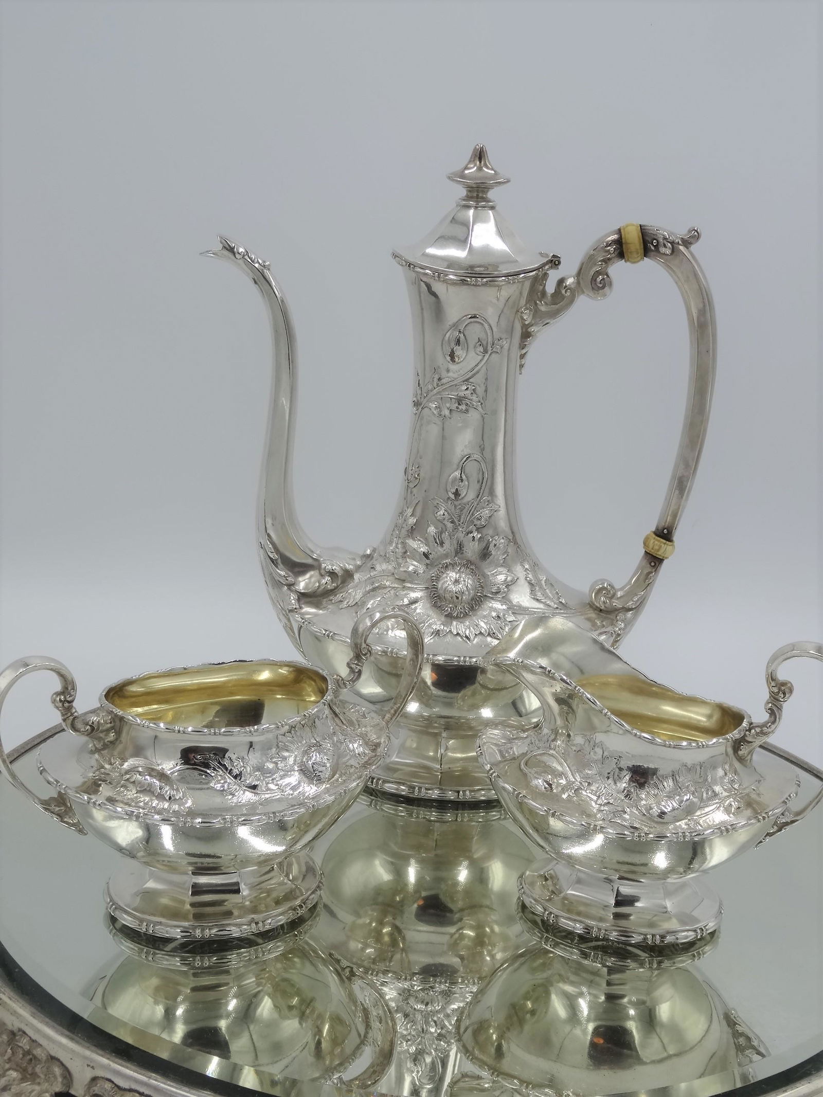 ANTIQUE FLORAL REPOUSSE' STERLING  TEA SERVICE. (1 of 8)