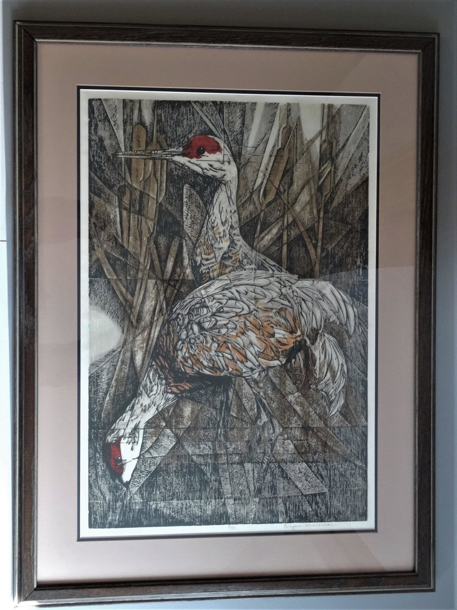 WOODCUT OF SAND HILL CRANES E.MECIKALSKI WI. ARTIST: A woodcut or linocut on Japan paper Titles "Sand Hill Cranes" Signed lower left Eugene Mecikalski . Wisconsin Artist b. 1927Numbered in pencil in center 5/35 The art piece itself measures: 16" by 24" 
