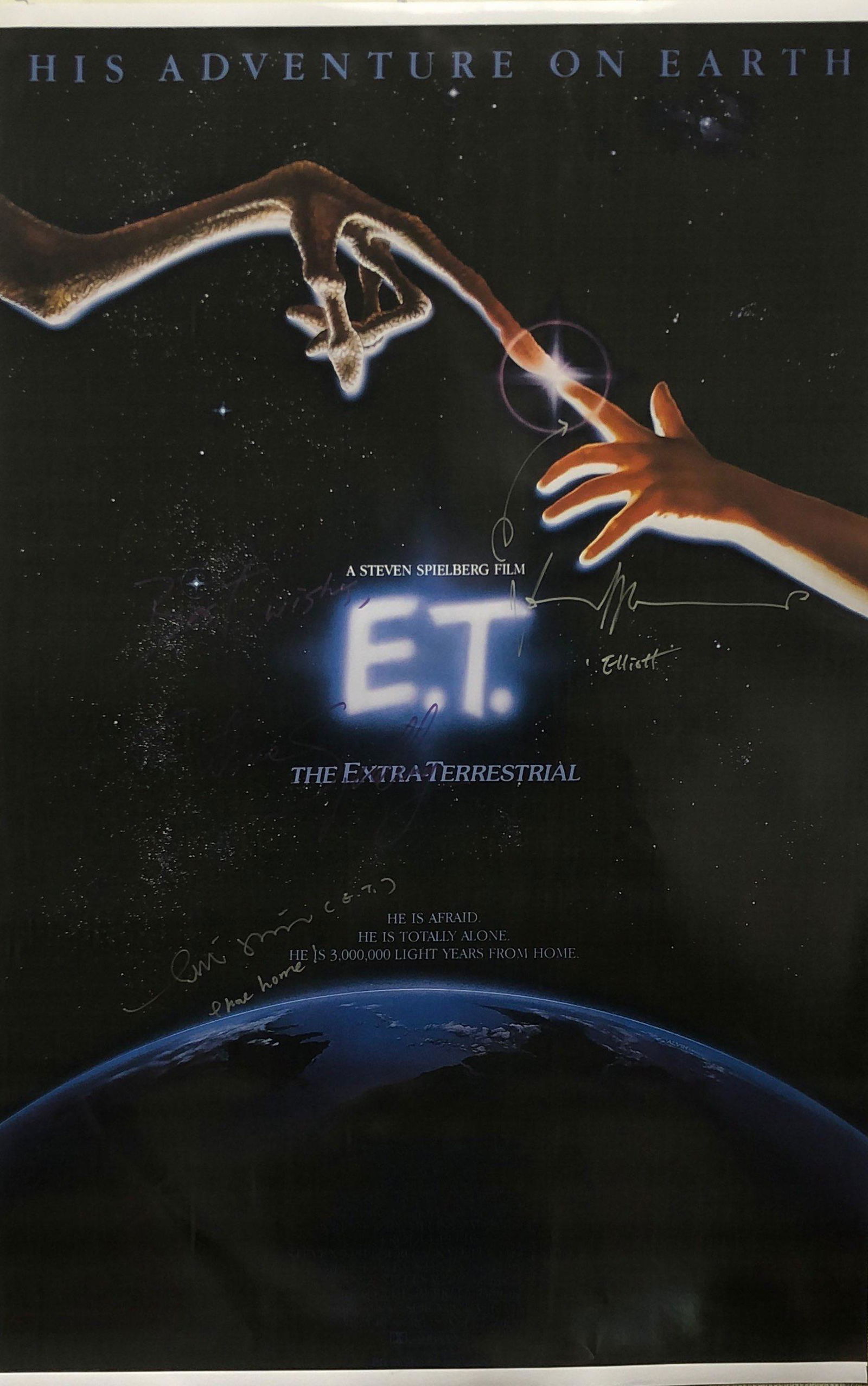 E.T. Poster Steven Spielberg Henry Thomas Autographed: Autographed by: Henry Thomas, Matthew De Meritt, Steven Spielberg Size: 24" x 36" All items come with COA which has professional authentication services by experts. Certificate come with unique silver