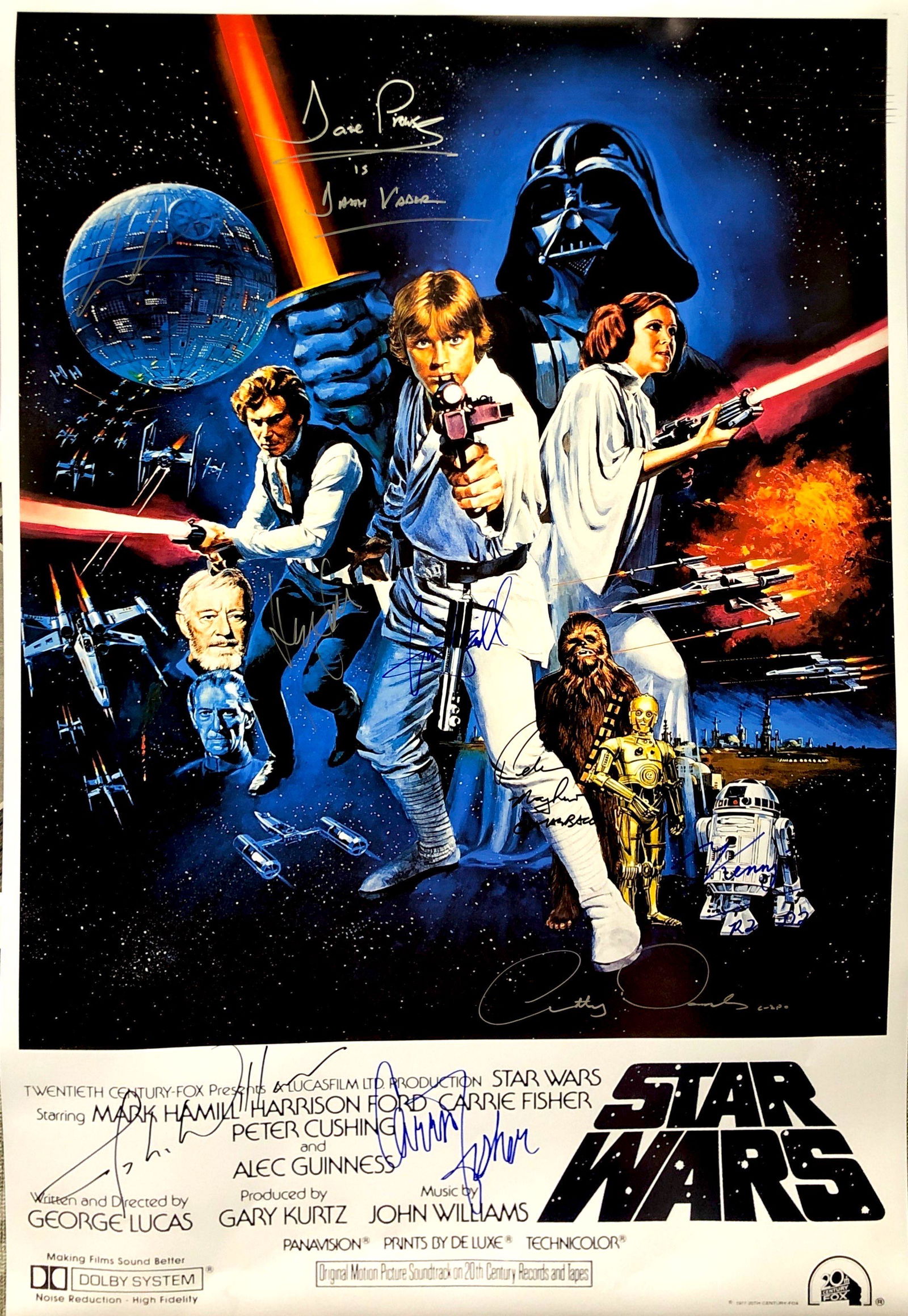 Star Wars New Hope Poster B Harrison Ford Carrie Fisher: Autographed by: Mark Hamill, Harrison Ford, Carrie Fisher, Dave Prowse, Anthony Daniels, Kenny Baker, Peter Mayhew, George Lucas and John Williams Size: 24" x 36" All items come with COA which has pro