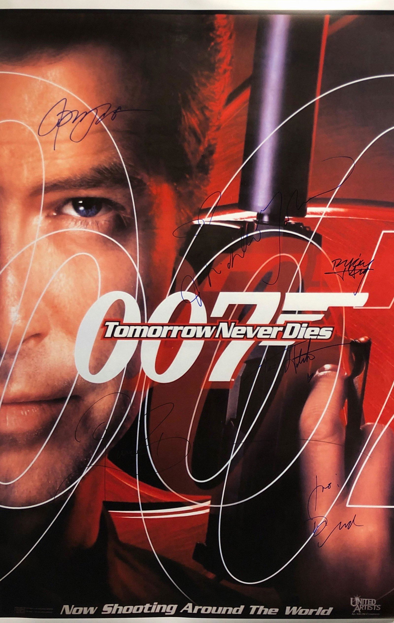 007 Tomorrow Never Dies Autograph Signed Poster: Autographed by: Pierce Brosnan, Jonathan Pryce, Michelle Yeoh, Teri Hatcher, Ricky Jay Size: 24" x 36" All items come with COA which has professional authentication services by experts. Certificate co