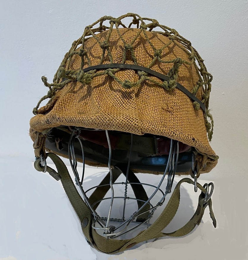 SOUTH AFRICA.SADF Paratrooper OTAN Jump Helmet: OTAN pattern helmet but with the 3 point attachment for the paratrooper chin-strap.Complete with hessian cover,net and rubber band.