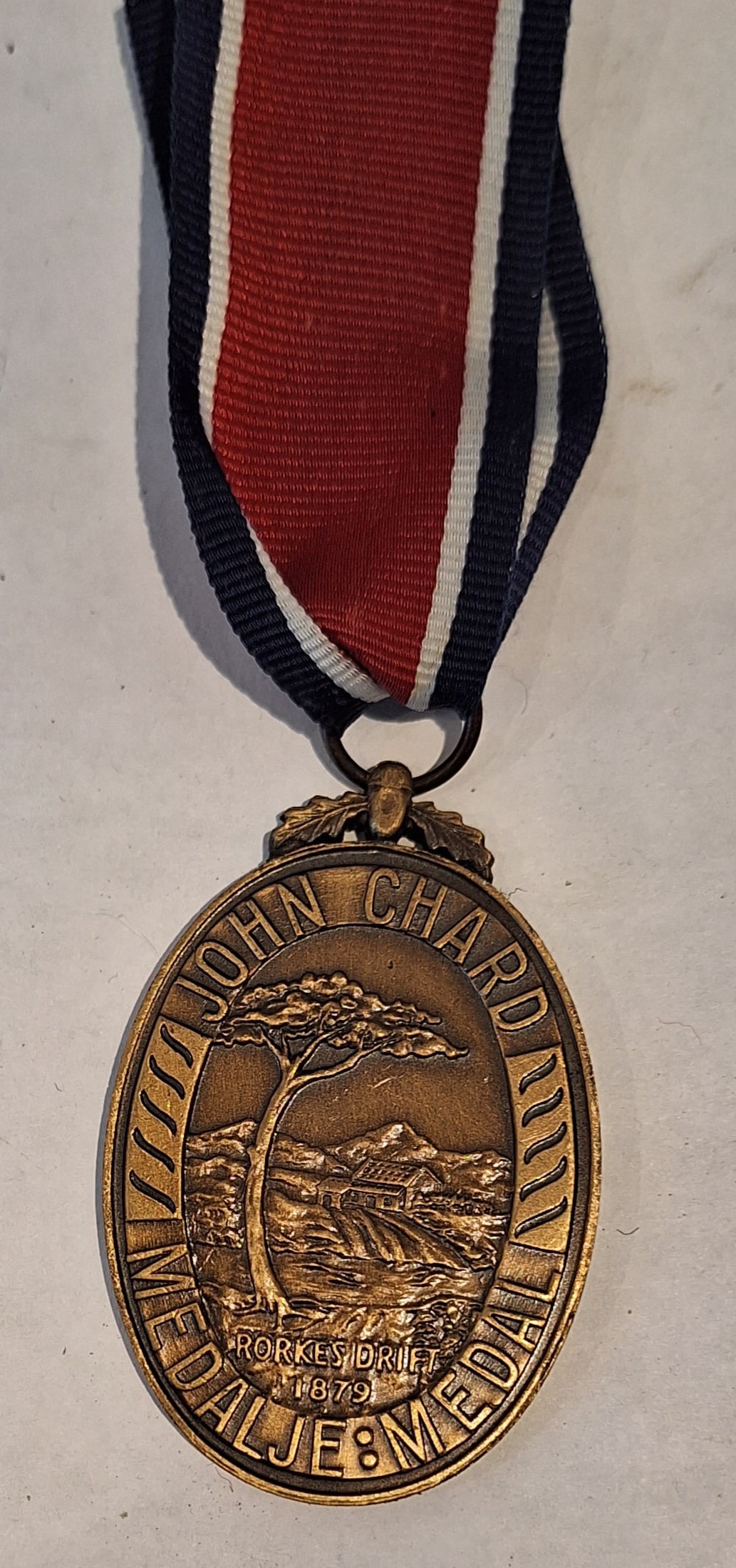 SOUTH AFRICA.SADF John Chard Medal: Full size medal with ribbon.SA Coat of Arms to rear.Number 14593 to rim.