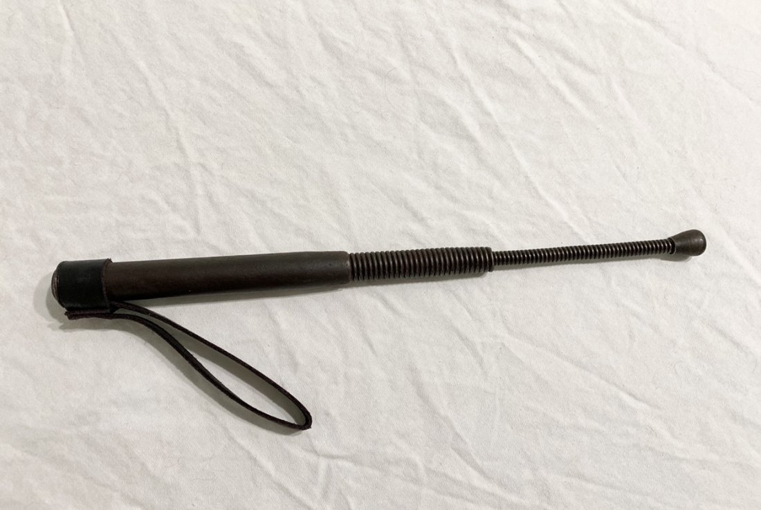 SiPo (Security Police) Baton for Beating Prisoners: SIPO Spring Steel Baton. Sicherheitspolizei (SIPO) Stahlrute used by Security Police of the III Reich. Blued steel tube loaded with two telescoping steel springs, cap marked SIPO (Security Police), bo