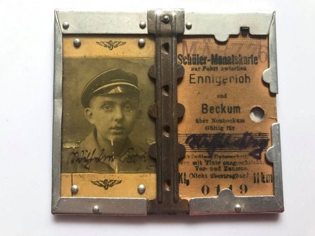 German Railway Metal Framed Student Ticket Beckum 1926: German Railway metal framed student ticket Beckum 1926 made by manufacturer Eller u. Schubert D.R.G.M, engraved on the reverse. 2 window metal frame, one for the photo of this boy and the other for th