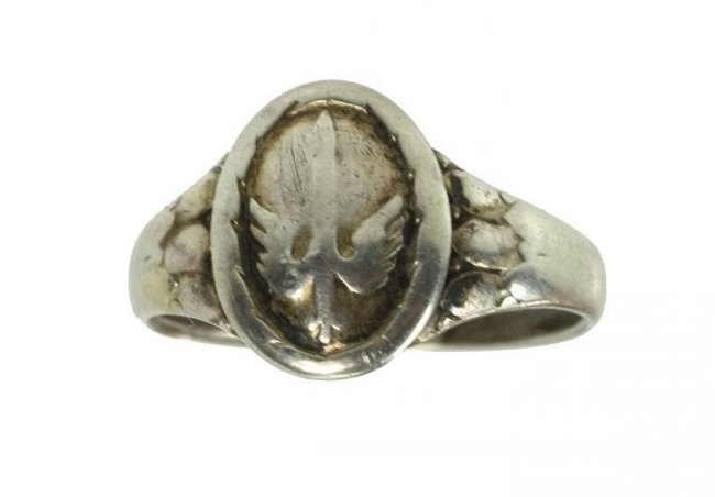 Silver Ring with Unknown Insignia - Possible Luftwaffe: German WWI or WWII ring with unknown unit insignia.German design silver ring with an emblem on the front plate. Emblem features a sword withwings, somewhat similar to an emblem of Taktische Luftwaffen